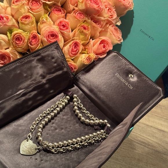 Tiffany & Co. Accessories - Tiffany & Co. Dark Brown Satin Jewelry Pouch with Silver Bead Chain